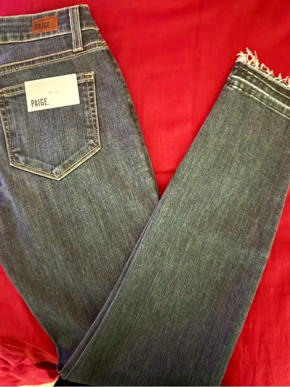 PAIGE Skinny Jeans in Dark Blue Denim with Frayed Hem